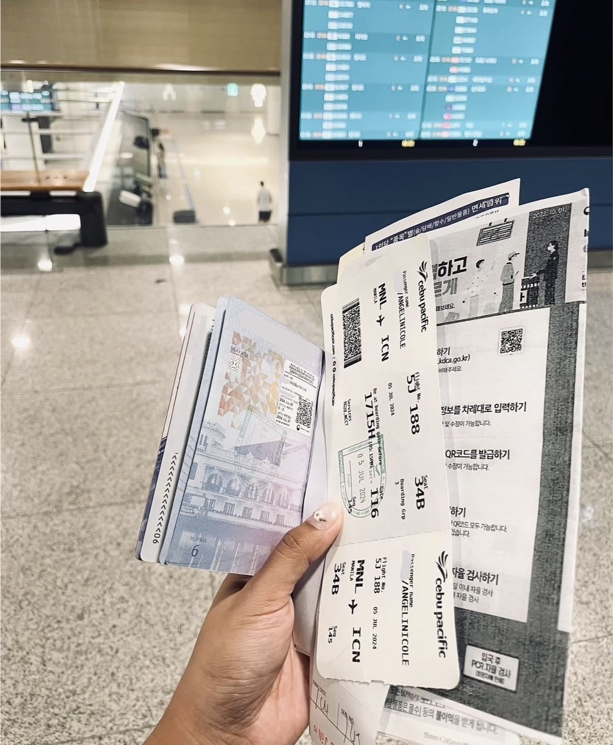 Cebu Pacific boarding pass and passport at the airport