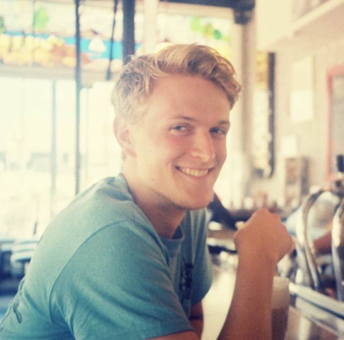 Smiling at a diner counter